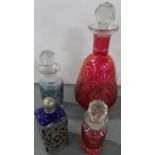 Three Victorian scent bottles together with a fine quality antique cranberry glass decanter (4)