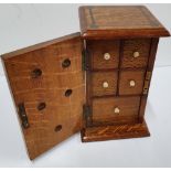 Fine quality, inlaid Art Nouveau Edwardian miniature traveling cabinet with 5 internal drawers, 23