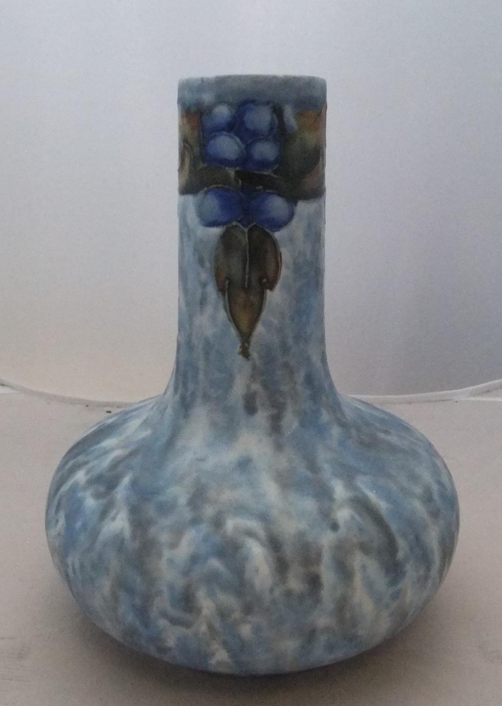 Stylised vintage Cranston pottery vase with grapes & leaves on mottled blue & grey ground 29 cm high