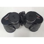 Pair of Tasco 10 x 50 binoculars together with case etc