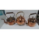 Collection of 3 copper antique kettles to include an unusual circular example (3)