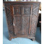 17th/18thC carved oak shelved cabinet with key, 124 x 84 cm by 50 cm deep