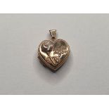 9ct yellow gold heart shaped pendant, inscribed "I love you" 1.1 grams
