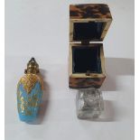 Tiny antique traveling ink bottle within its own purpose made box together with an antique purfume