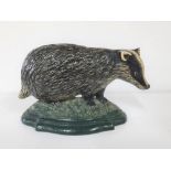 20thC cast iron door-stop, Badger