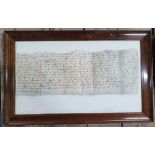 Wood framed antique written document on vellum, The internal measurements are 18 x 50 cm