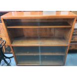 Mid 20thC glass fronted book case, 118 cm wide x 107 cm high x 29 cm deep
