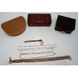 Three various vintage leather travel jewellery boxes together with costume necklaces etc (1 a/f)