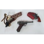 Three vintage cap pistols including a Lugar (3)