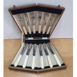 Fine quality Edwardian fish knives & forks with bone handles set in a fan shaped case