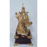 Stunning, late 20thC Chinese warrior finely cast in heavy gilt metal inset with coloured stones, sat