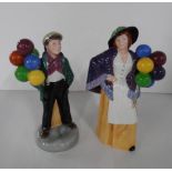 Royal Doulton balloon boy & balloon girl, one signed to base "Phillip Green" (2) 23 cm tall