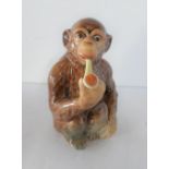 Rare Beswick monkey smoking pipe, impressed marks 1049