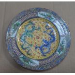 Unmarked, antique Chinese plate decorated with 2 dragons, 19cm in diameter