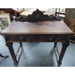 Finely carved antique two-drawer hall table/desk, 105 x 57 x 75cm
