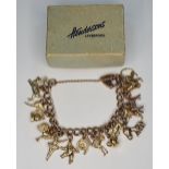 9ct yellow gold ladies charm bracelet set with approx 16 marked & unmarked 9ct gold charms, total 79