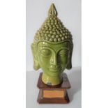 Fine quality, early 20thC green crackle glazed head of Hindu Goddess sat on a separate ceramic
