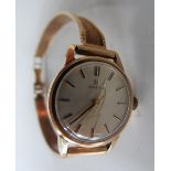 A vintage unboxed Omega 9ct gold ladies watch set to a 9ct gold bracelet strap, 19 grams gross