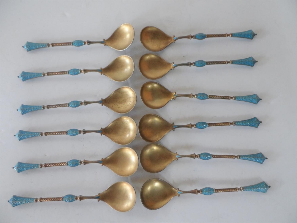 Stunning set of 12 Norway gilded & enamelled silver spoons, imported & stamped to Birmingham 1900 in