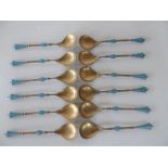 Stunning set of 12 Norway gilded & enamelled silver spoons, imported & stamped to Birmingham 1900 in