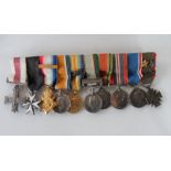 Set of 10 miniature medals to include WW1 & India, north west frontier 1936-37 etc in Spinks case
