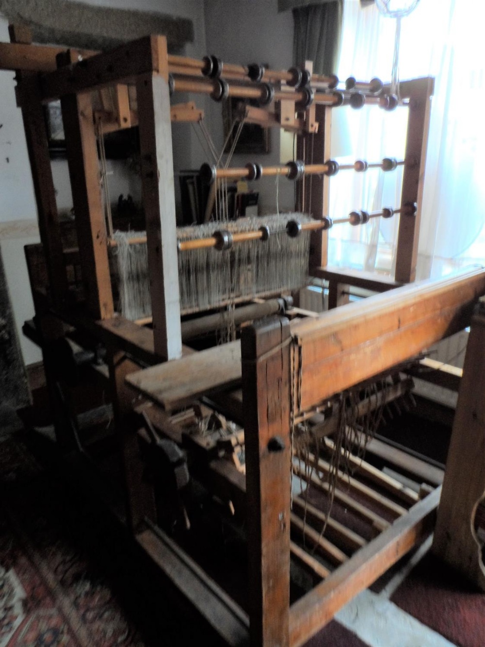 Full-sized antique weavers loom, measuring approx 160cm long x 115cm wide by 175cm high, The loom