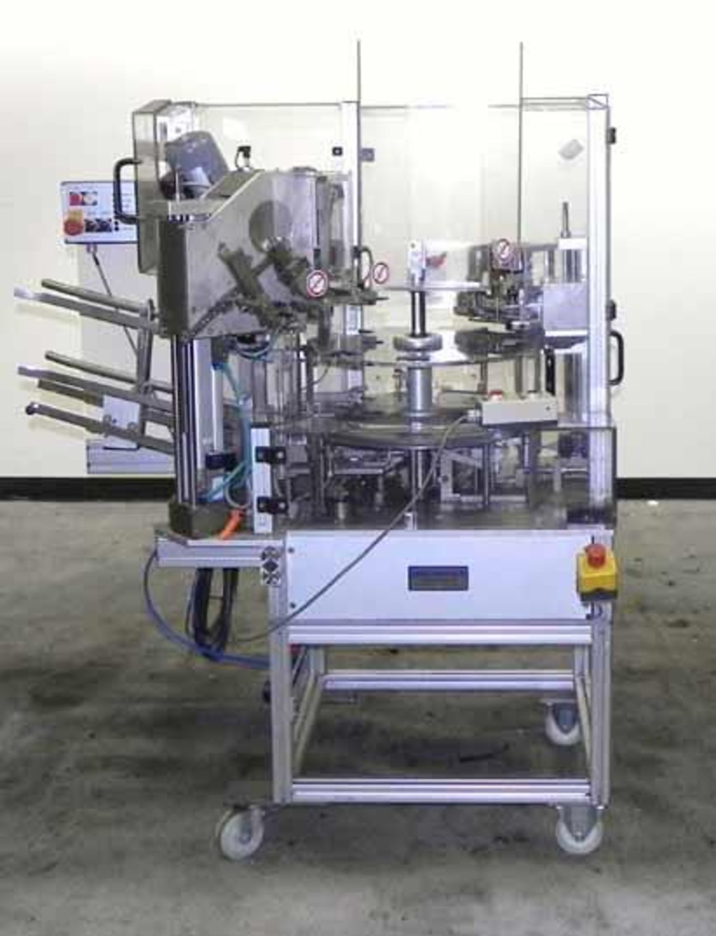 Used- Brunner Model VC Vertical Semi AutomatiC Cartoner. Capable of speeds up to 30 cartons p/minute