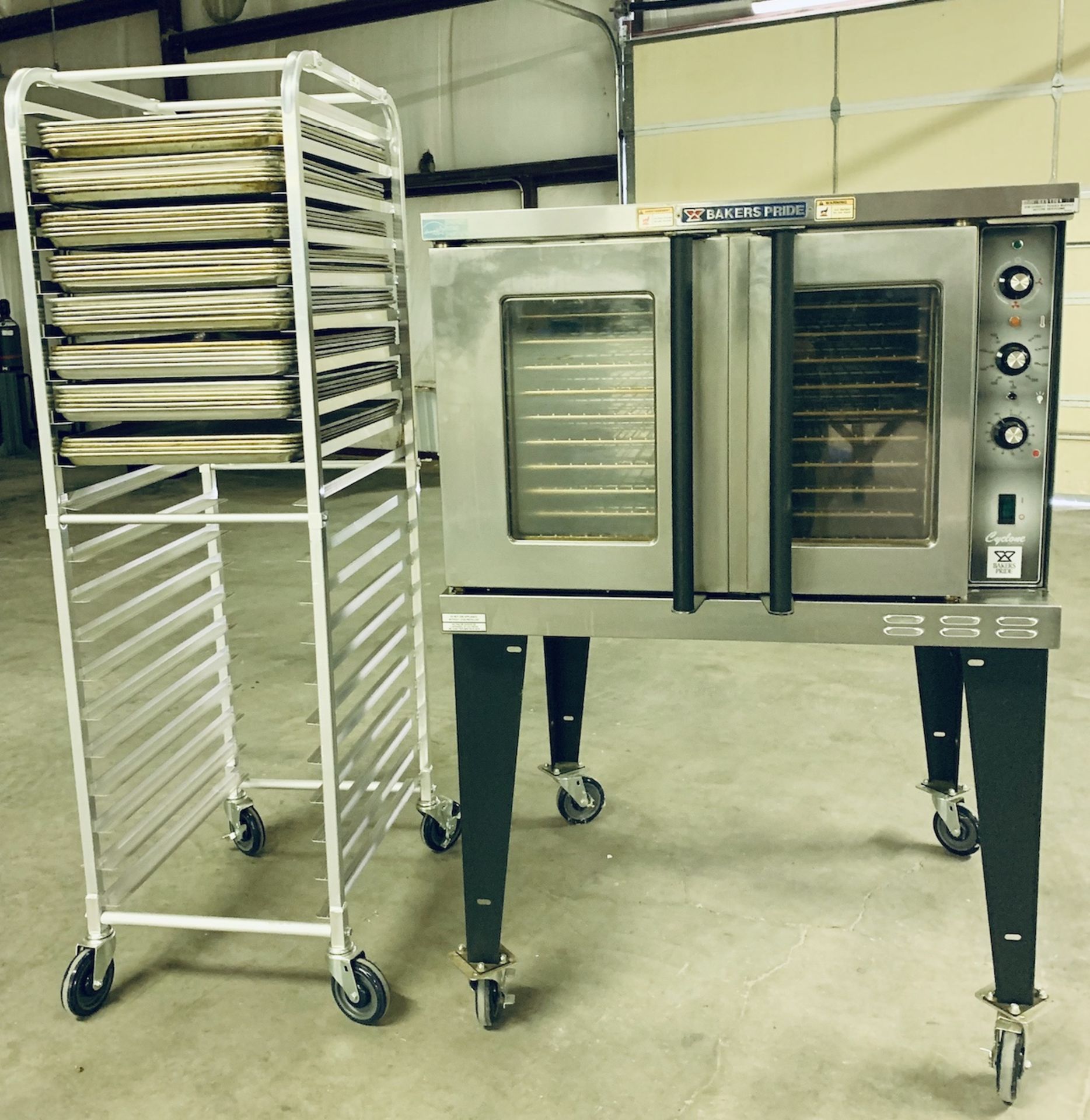 Used Bakers Pride Cyclone Series Single Deck Full Size Electric Decarb Oven. Model BCO-E1w/ 39 trays