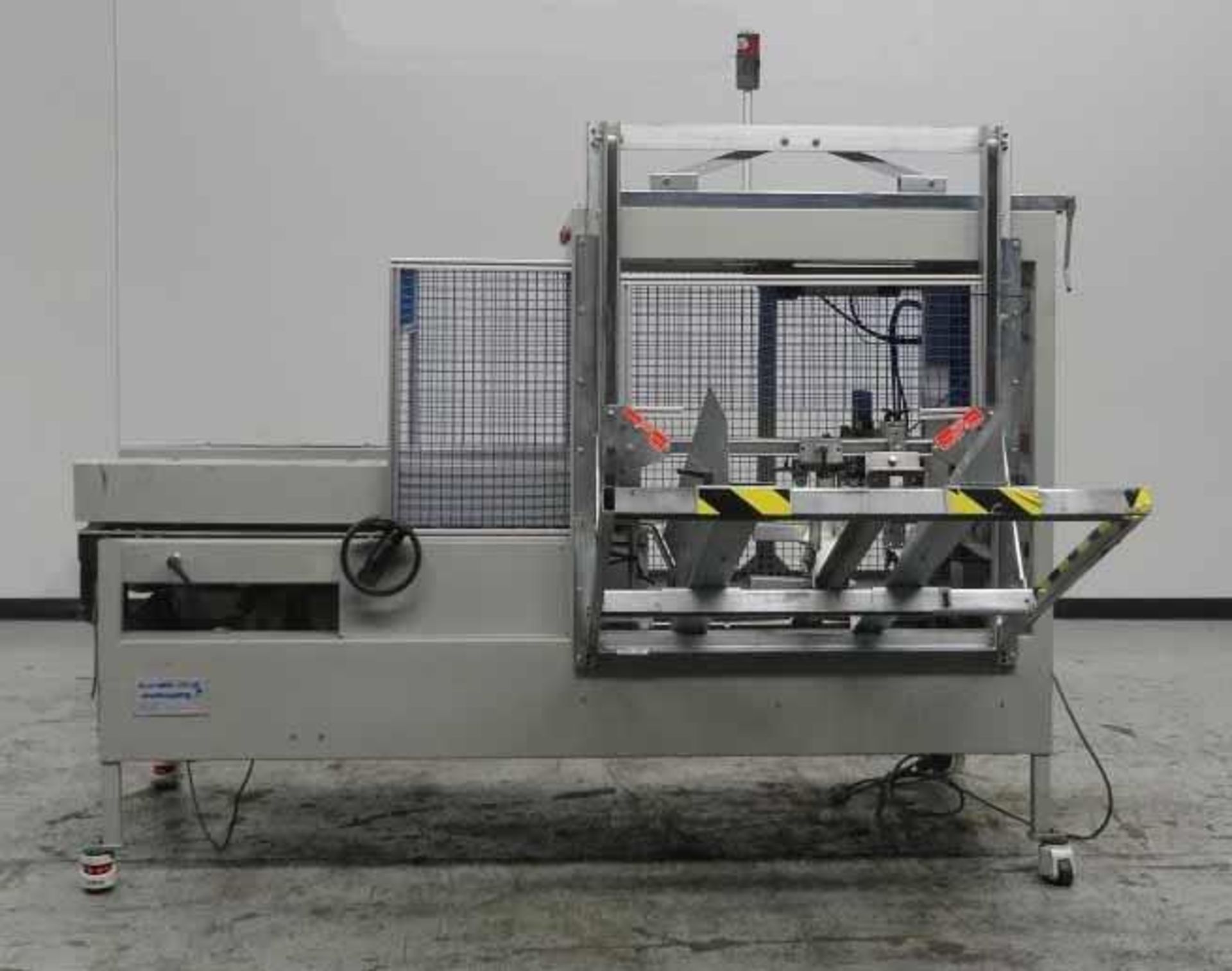 Used- Durable Packaging (OK International) Model CA1800 Automatic Case Erector & Bottom Case Sealer