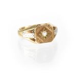A gentlemen's 9ct yellow gold signet ring with central white stone in star setting, size R,