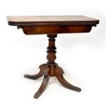 A 19th century mahogany fold-over tea table with two drawers,