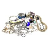 A quantity of costume jewellery to include necklaces and rings.