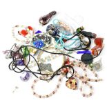 A quantity of mainly glass jewellery to include Murano.