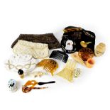 A collectors' lot comprising vintage evening bags, hair combs, etc.