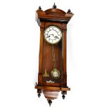 A 20th century mahogany-cased Vienna eight-day wall clock,