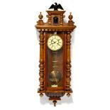 A walnut Vienna wall clock, the ivorine dial set with Roman numerals and marked 'GB',