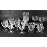 A set of five crystal Champagne bowls, four cut glass sundae dishes,