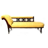 An Edwardian mahogany chaise longue with button-back upholstery in a cream fabric,