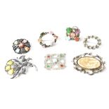 Four various Scottish-style brooches, a similar ring and two further brooches (7).