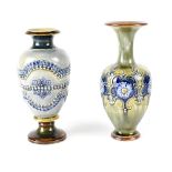 Two c1900 non-matching Doulton Lambeth vases, one pale blue ground with raised decoration,