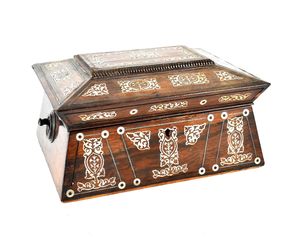 A Victorian rosewood and mother of pearl inlaid jewellery box of sarcophagus form,