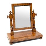 A Victorian mahogany swing toilet mirror, the rectangular mirror plate on turned supports,
