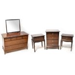 A Stag Minstrel part bedroom suite comprising a dressing chest with attached mirror,