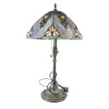 A Tiffany-style table lamp, solid metal Art Deco column to circular spreading base,