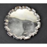 An Elizabeth II hallmarked silver salver with pie crust rim, London 1997, RC, approx 4.