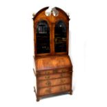 A reproduction mahogany bureau bookcase,