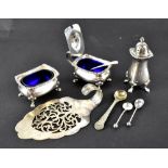 A George V hallmarked silver three-piece cruet, salt and mustard with blue glass liners, pepper pot,