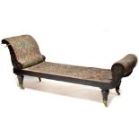 A Victorian mahogany day bed with scroll arm,