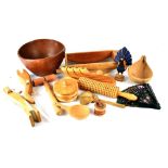 A quantity of Swedish carved wooden and treen items including an apple press,