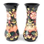 A pair of Moorcroft 'Oberon' pattern waisted vases, blue ground with tube line decoration,